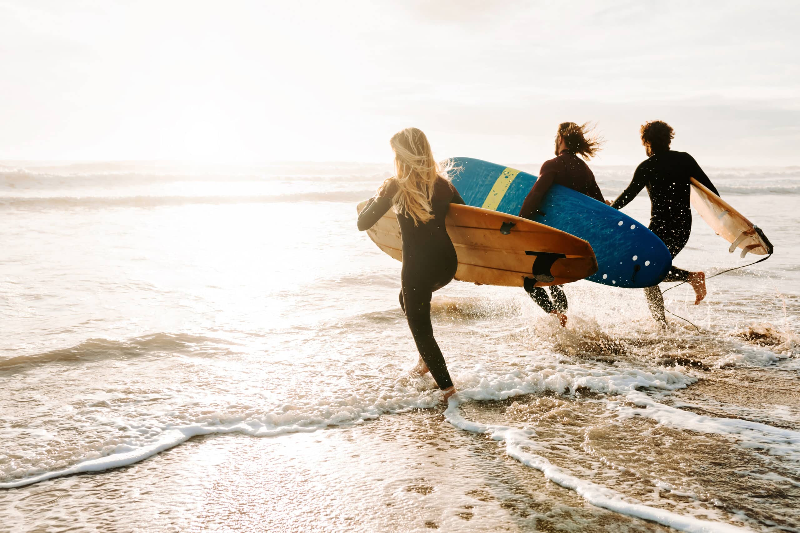 Header image for The Haven Center - Cape Cod Dispensaries | Surfer at the beach